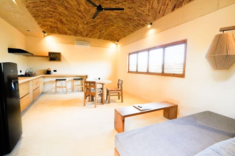 Deluxe Apartment, Bathtub, Partial Ocean View | Private kitchen | Full-size fridge, microwave, stovetop, espresso maker