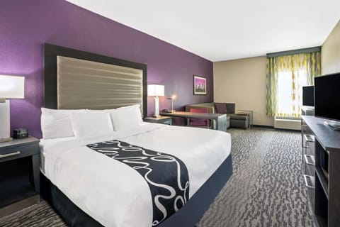 Deluxe Suite, 1 King Bed, Non Smoking | Premium bedding, desk, blackout drapes, iron/ironing board