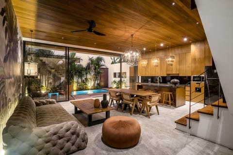 Deluxe Villa, 3 Bedrooms, Balcony, Pool View | Living area | 32-inch Smart TV with digital channels