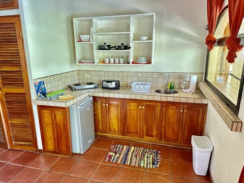 Studio, Accessible, Pool View | Private kitchen | Fridge, stovetop, coffee/tea maker, coffee grinder