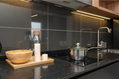 Luxury Suite, 2 Bedrooms, City View | Private kitchen | Fridge, microwave, stovetop, electric kettle