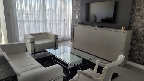 Premium Room | Living area | 42-inch Smart TV with digital channels