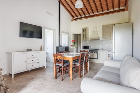 Villa | Living area | 32-inch flat-screen TV with cable channels