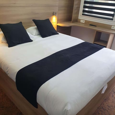 Individually furnished, desk, laptop workspace, iron/ironing board