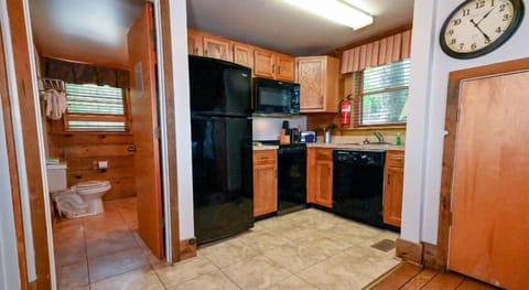 Premier Cabin, Jetted Tub | Private kitchen | Full-size fridge, coffee/tea maker, cookware/dishes/utensils