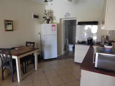 Grand Studio, Accessible, Poolside | Private kitchen | Full-size fridge, microwave, stovetop, coffee/tea maker