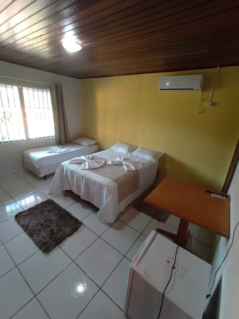 Family Triple Room | Desk, laptop workspace, free WiFi, bed sheets