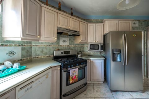 Comfort House, Ocean View, Mountainside | Private kitchen | Full-size fridge, microwave, oven, cookware/dishes/utensils