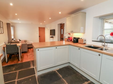 Fridge, electric kettle, toaster, cookware/dishes/utensils