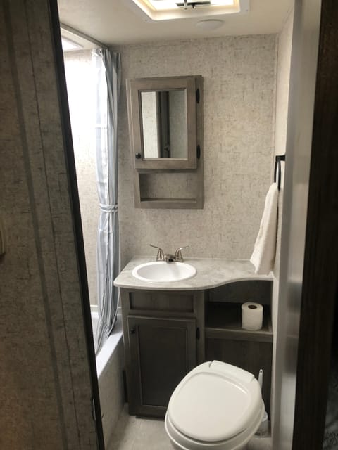 Bathroom, with shower, vanity, and toilet