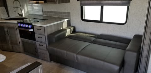 The couch folds down to a small bed. 