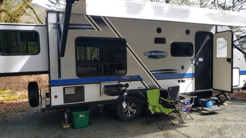 Exterior of trailer. Adjustable awning and Exterior BBQ