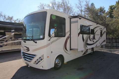 This 31’ foot A Class RV with a super slide out offers tons of comfortable, cooled space.