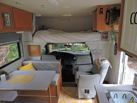 Cozy interior with extra long over cab bed 