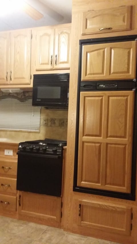 Stove and oven , microwave and fridge and freezer 