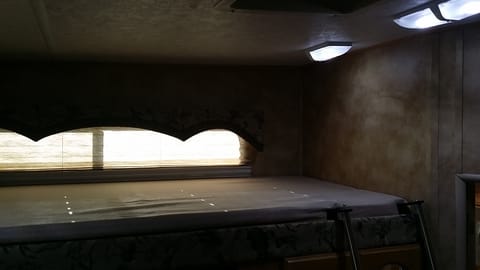 Rear bunk house upper bunk bed 