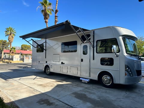 Brand new RV awning, perfect for sunny days outdoors. Outdoor TV included on side of RV