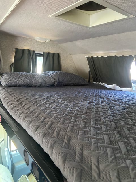 Spacious bed over the cab, can sleep 2 adults comfortably