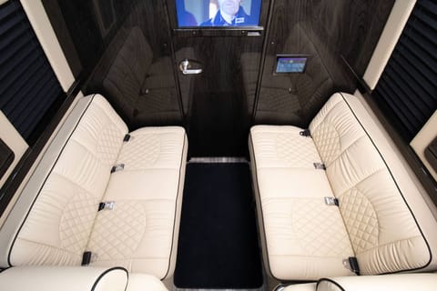 The rear lounge area has two sofas and seat four passengers. 