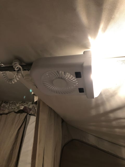 2 bunks fans have a light . These are installed right above each sleeping quarters( bunk ends) provide great air circulation along with white noise . 