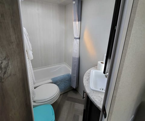 This bathroom is actually quite roomy!  It even has a bathtub for the littles.