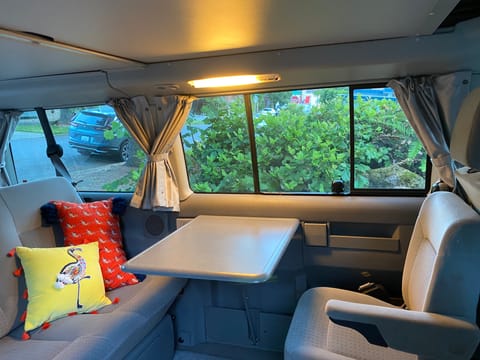 This table folds out and is convenient for picnics inside the van.