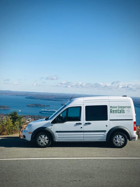 On top of Cadillac Mountain. RVs are not allowed up here, but our van is! Enjoy the view of Bar Harbor from this popular destination in Acadia. 
