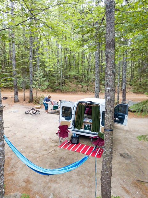 Maine has fantastic campsites. The van easily fits into any non-walk-in site. Taken in Baxter which is 3 hours from Portland, Maine. 