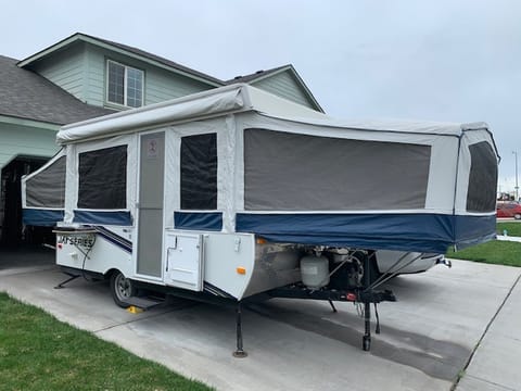 Trailer fully set up, awning comes attached and can be put if if desired