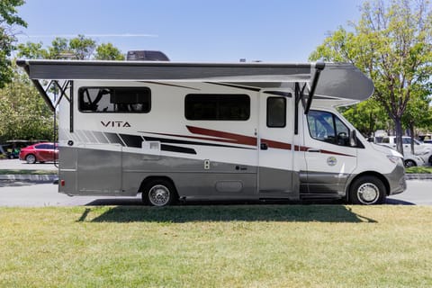 2020 WINNEBAGO VITA 24F awning in out position- led light under awning.