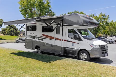 2020 WINNEBAGO VITA 24F awning in out position.