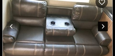 Sofa with flip down center and 2 cup holders