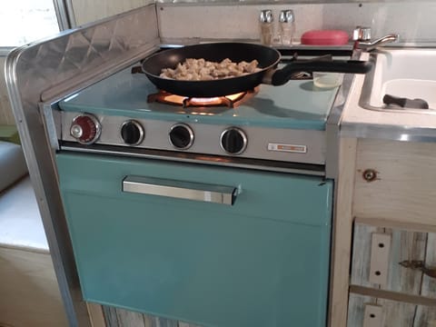 The stove and oven are fully functional.