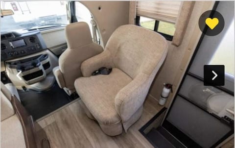 The swivel chair (located behind passenger seat) is good for still having a view of the road, but will also allow you to be in back with the kids!