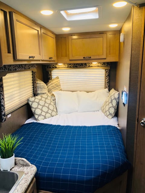 Master Bedroom with queen bed. The refrigerator is not blocking the foot of the bed. You can see the whole RV from this bed.
