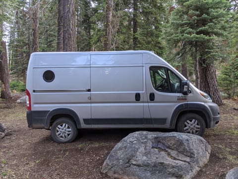 Ram Promaster. Has a stealth look, port hole window.