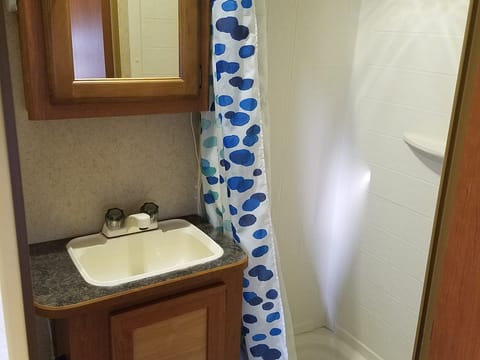 3 piece bathroom, shower almost 7 feet high.