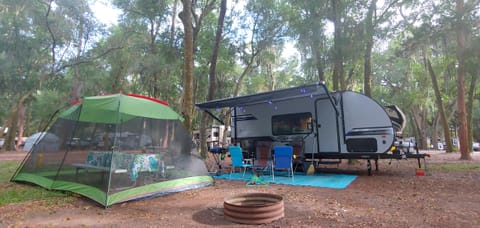 Complete outdoor setup.  Netted enclosure to help keep bugs away from picnic area only $10 daily.