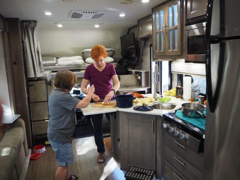 Spacious kitchen that two can work in.  With an fold down counter extension.