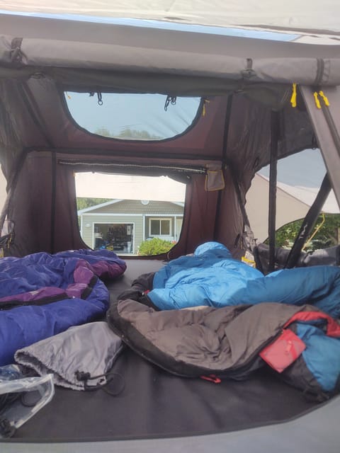 Comfy sleeping - lots of windows & air. 2 person sleeping bag converts to 2 - 1 person bags (depending on the type of traveling relationship you like)
