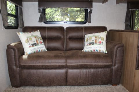Sofa transforms into a sofa bed which is good for 1 adult, or 2 kids.  Simple to open and close.