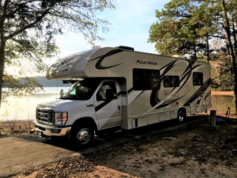 Beautiful and clean, Class C motorhome will get your family down the road and camping in style!