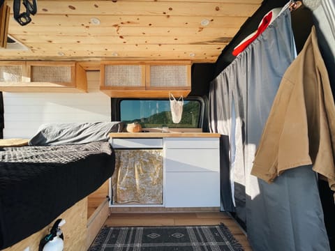 Enjoy storage in floor and overhead cabinets. In the kitchen you'll find some basic necessities for camp cooking, and a frosty dometic refrigerator 