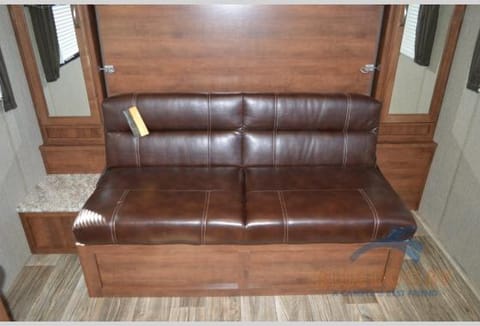 Jack-knife sofa with storage underneath. It can be used all the time including when it is converted to a bed.
