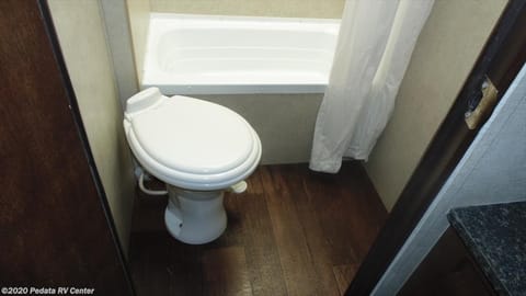 This is a picture of the toilet and tub.