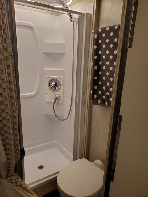 Basin sink is outside of this room. RV toilet paper provided
