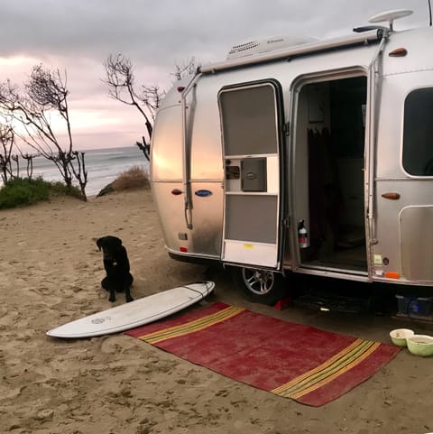 Besie and our dog Asha enjoying beach camping and adventures at Jalama