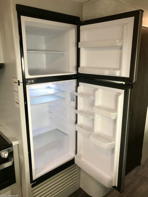 Large 10 cubic foot SS GE fridge and freezer 