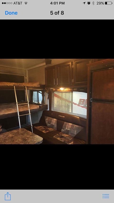 Inside sleeps two queen beds (bunks auto power up or down - very easy to use), couch is one full size couch that reclines to a sleeper.  In addition everything folds up so you can tow and haul items in luxury.