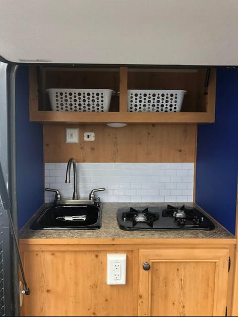 Sink, two gas burner Stove and convenient storage